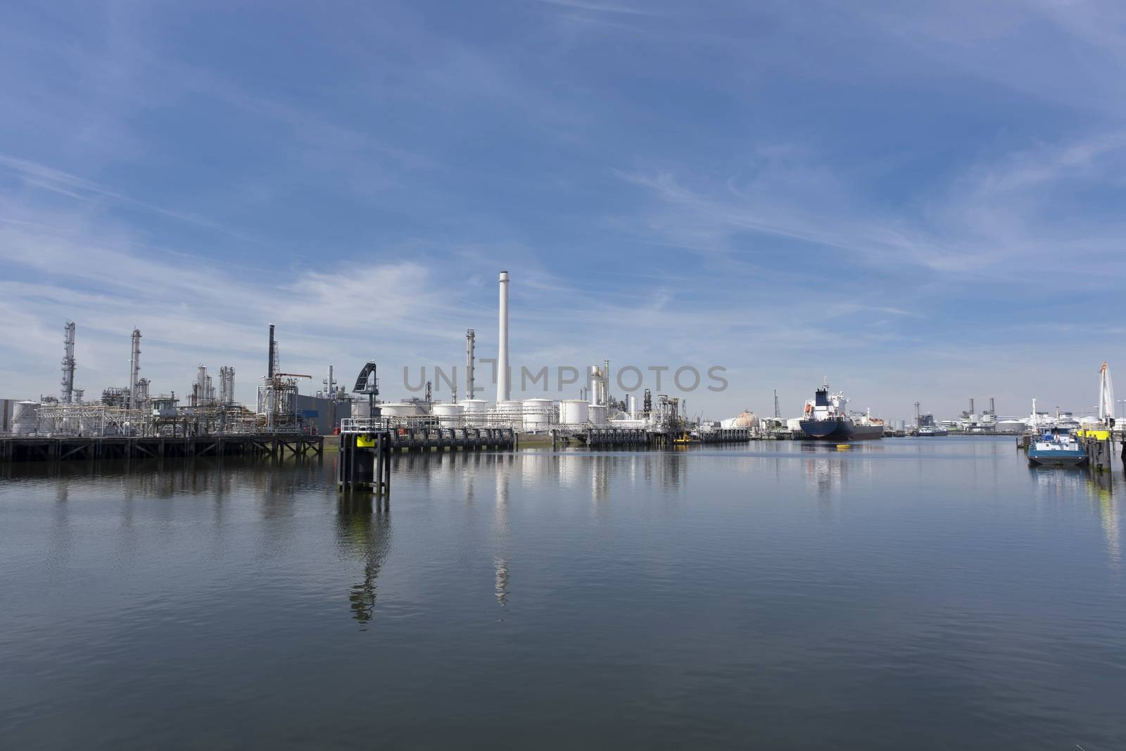 Industrial area in the Port of Rotterdam in The Netherlands. by Tjeerdkruse