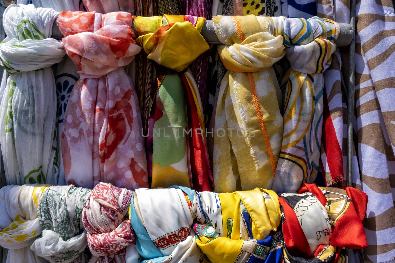 Colorful scarves at a market in the Netherlands. Colors of textiles