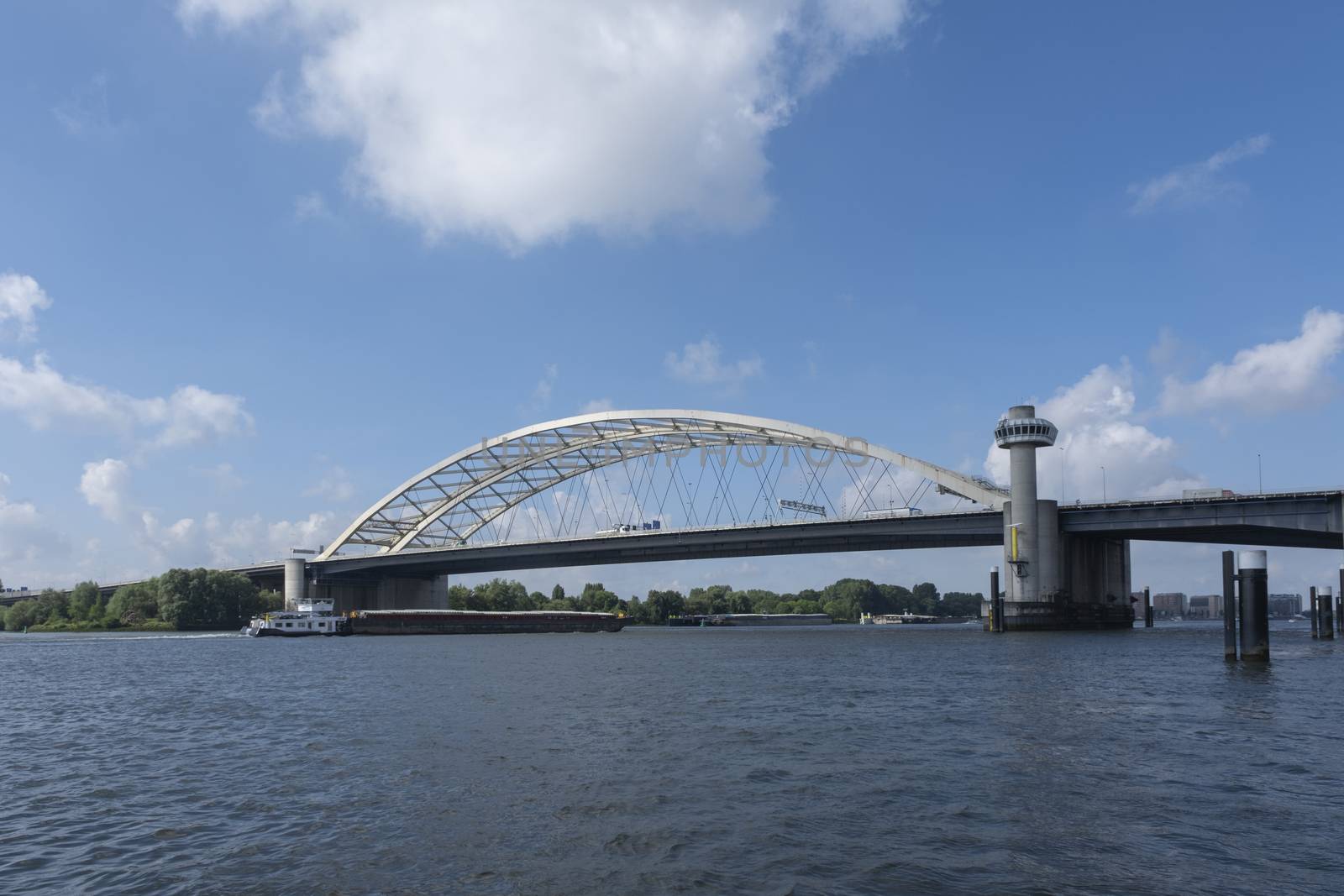 Van Brienenoord Bridge in Rotterdam over the river by Tjeerdkruse