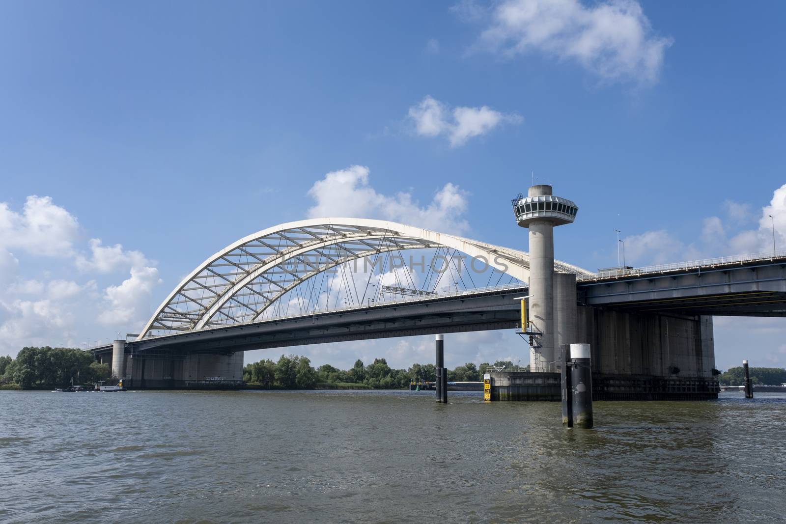 Van Brienenoord Bridge in Rotterdam over the river by Tjeerdkruse