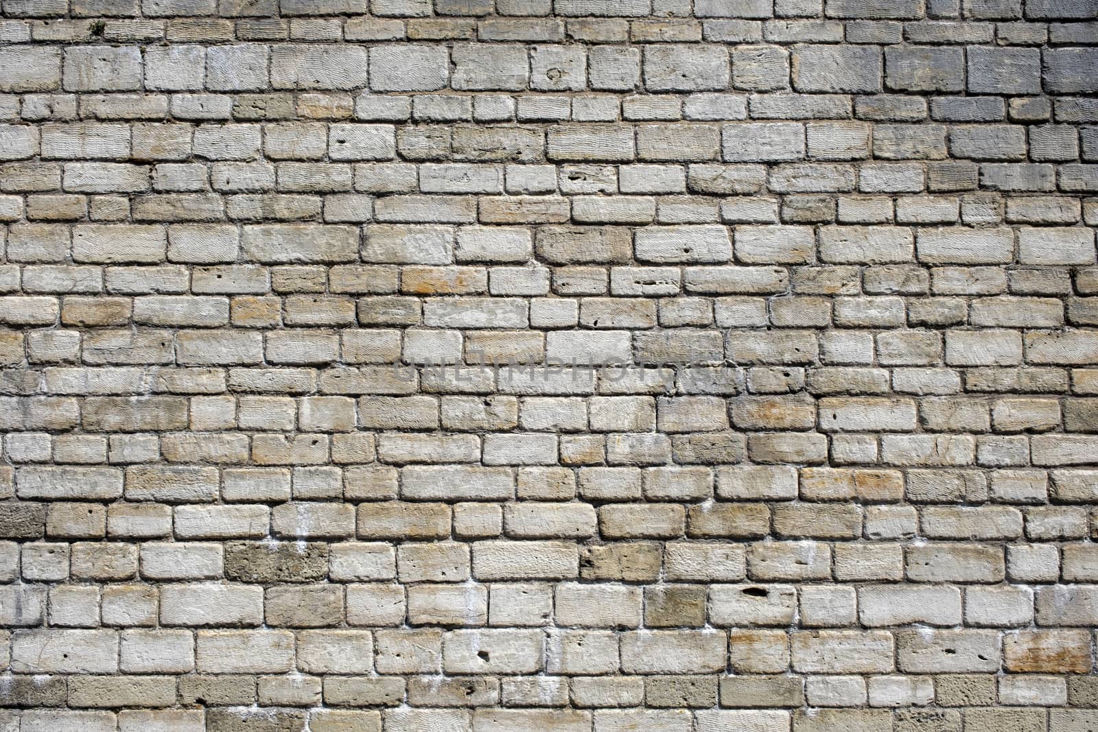 Stone wall. A texture background natural color by Tjeerdkruse