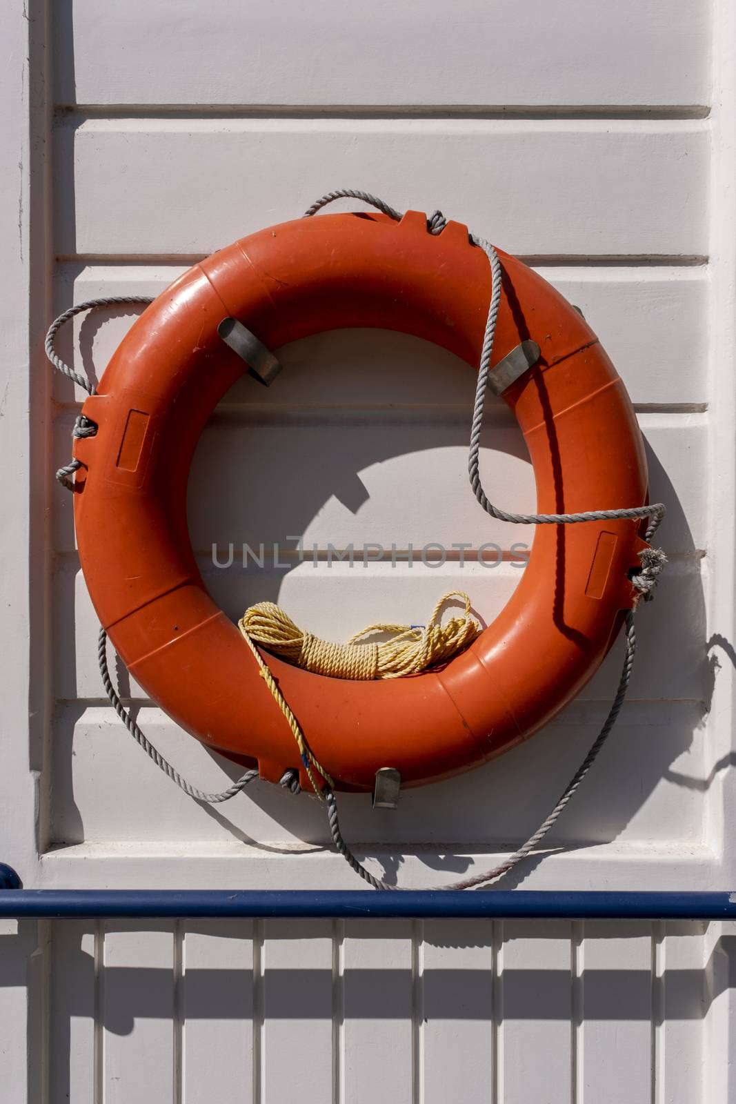 Lifebuoy on a wooden background. Help, rescue concept by Tjeerdkruse