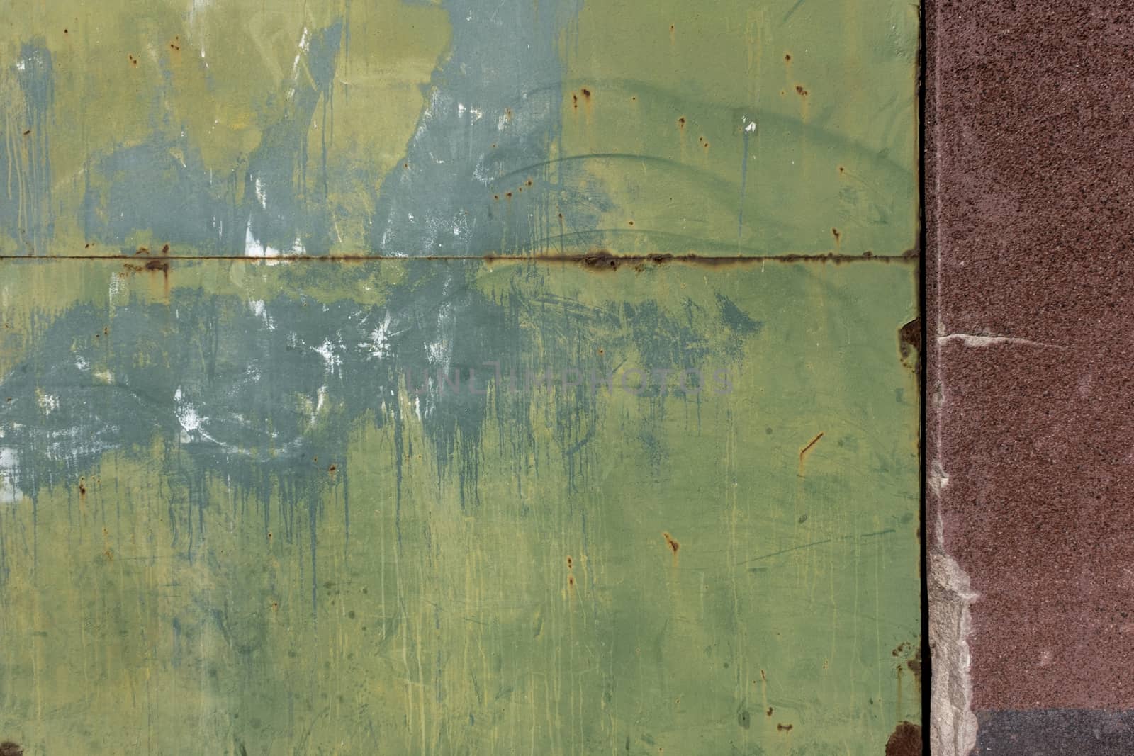 Rusty metal surface with colored paint flaking and cracking text by Tjeerdkruse