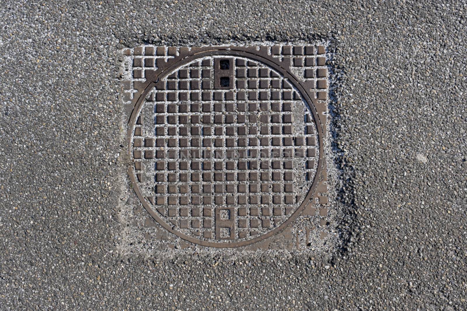 Rusty manhole cap, grunge manhole cover square