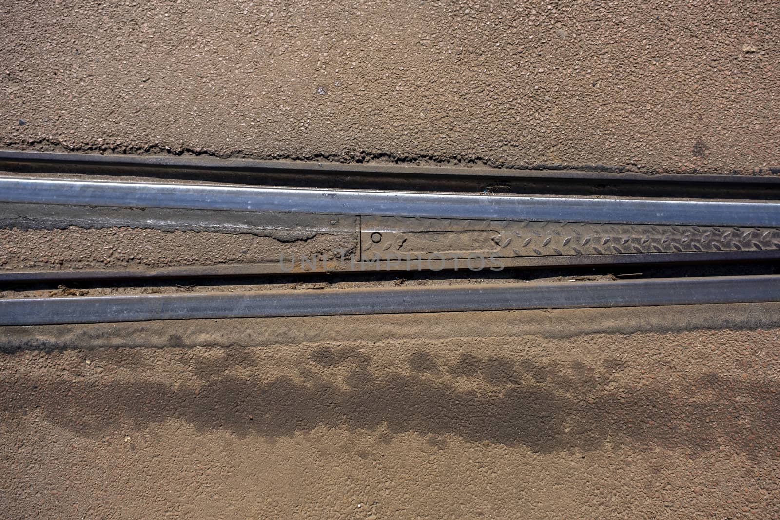 Tram tracks crossing each other. close up by Tjeerdkruse