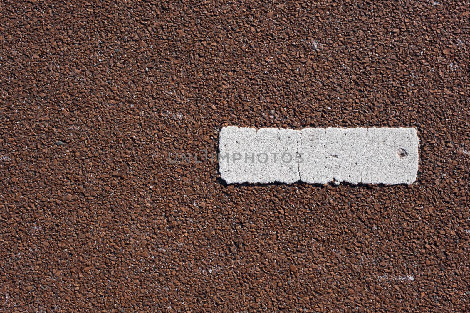 Tarmac texture. Markings painted on a tarmac road. Top view by Tjeerdkruse