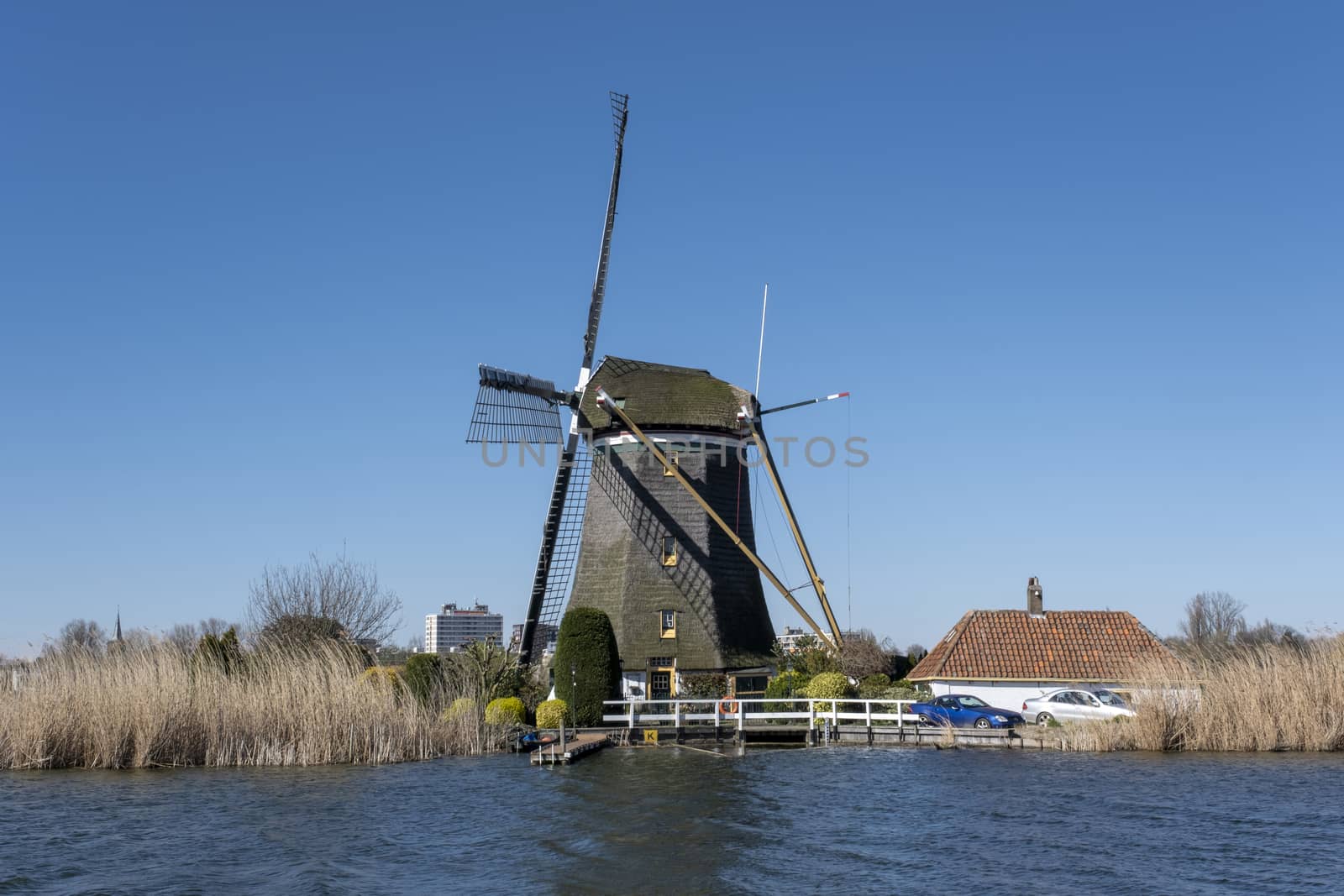Dutch windmil an UNESCO world heritage site. Stone brick Windmil by Tjeerdkruse