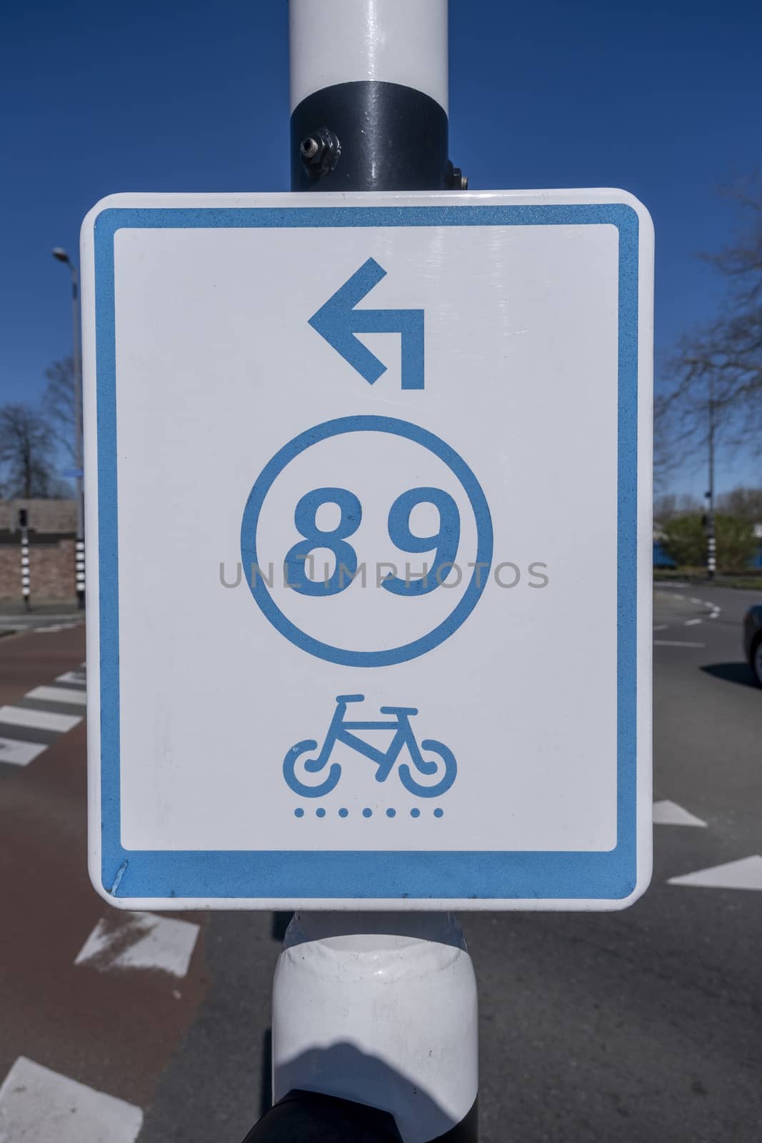 Bike route sign in the Netherlands by Tjeerdkruse