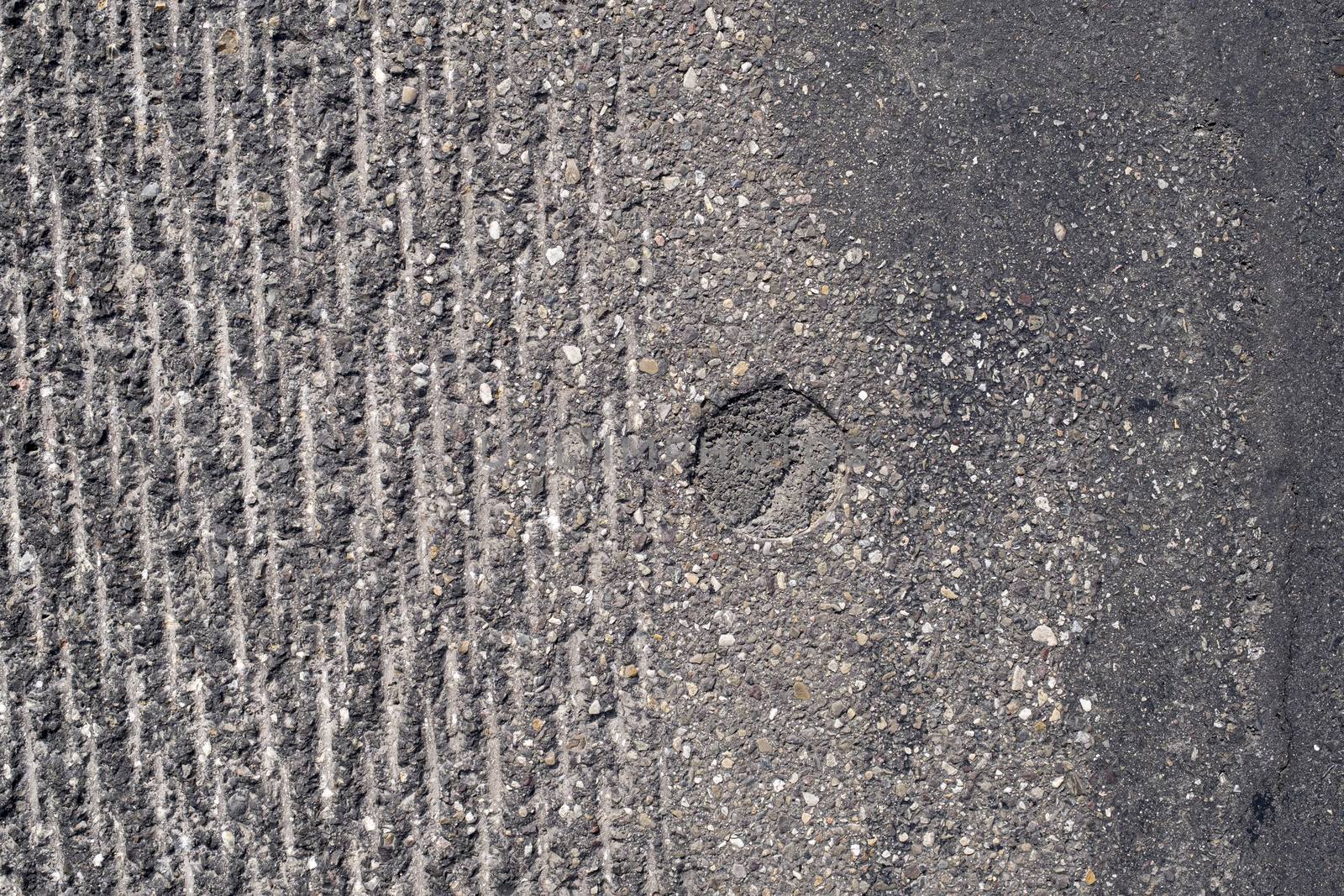 Surface grunge rough of asphalt, Seamless tarmac dark grey grain by Tjeerdkruse