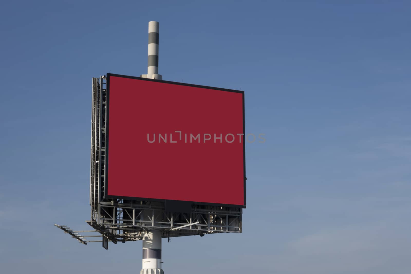 Billboard against clouds and blue sky background. Copy space ban by Tjeerdkruse