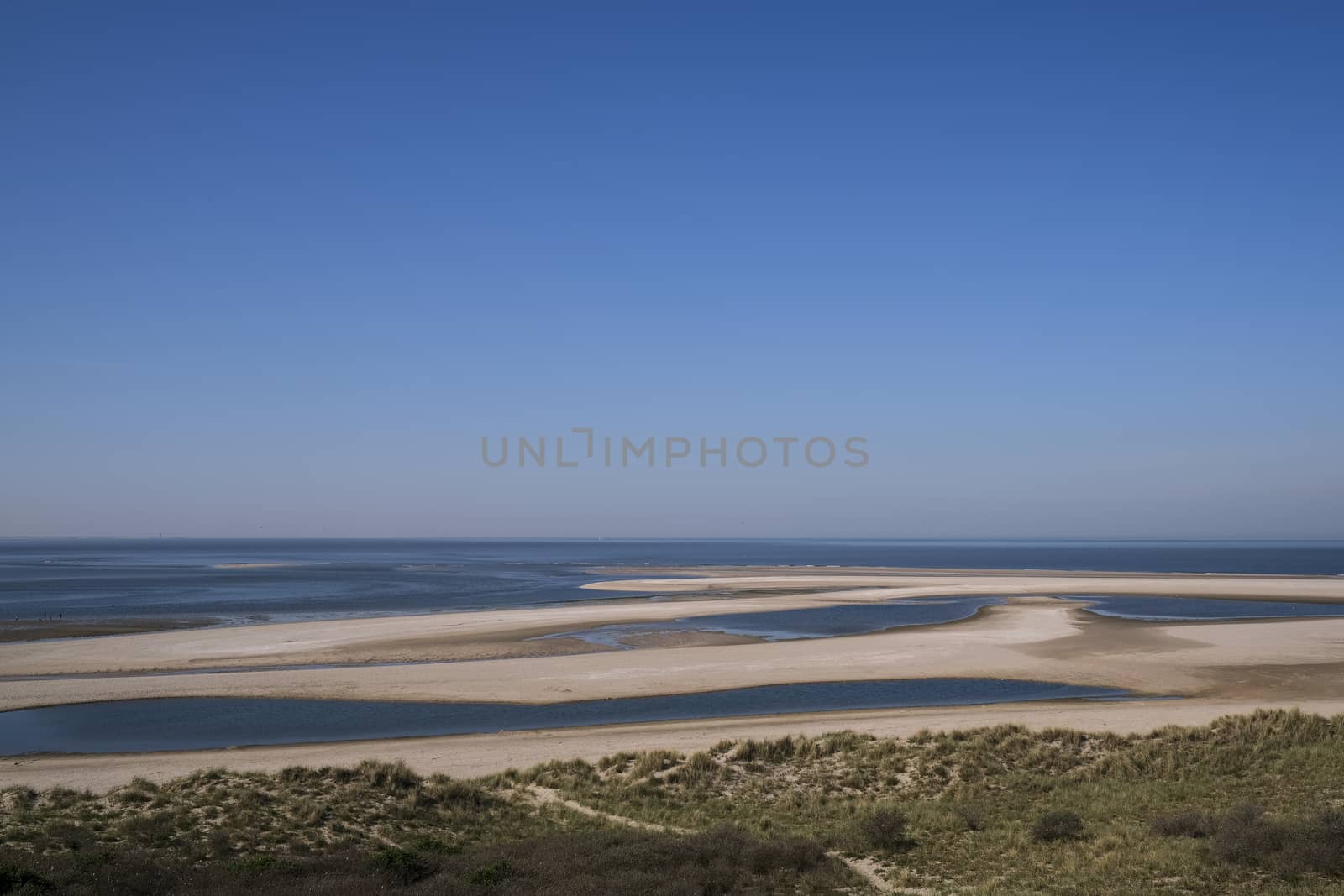 Dutch landscape, North sea sandy beach during low tide near the  by Tjeerdkruse