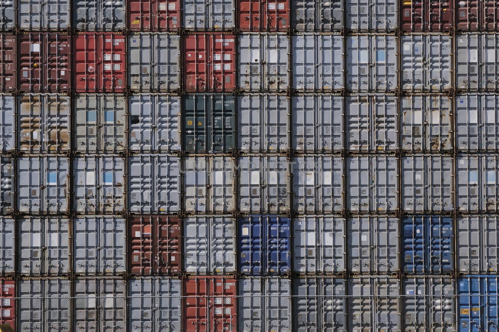 Stack of containers in harbor. Seamless texture industrial background