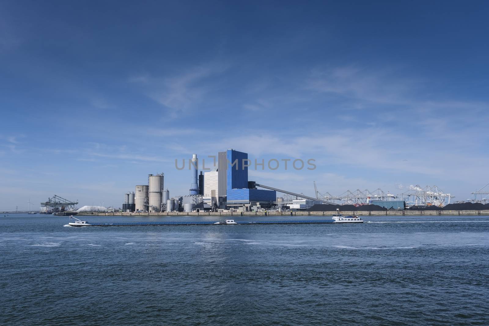 Refinery tower in petrochemical industrial plant with cloudy sky, Refinery factory oil storage tank and pipeline steel