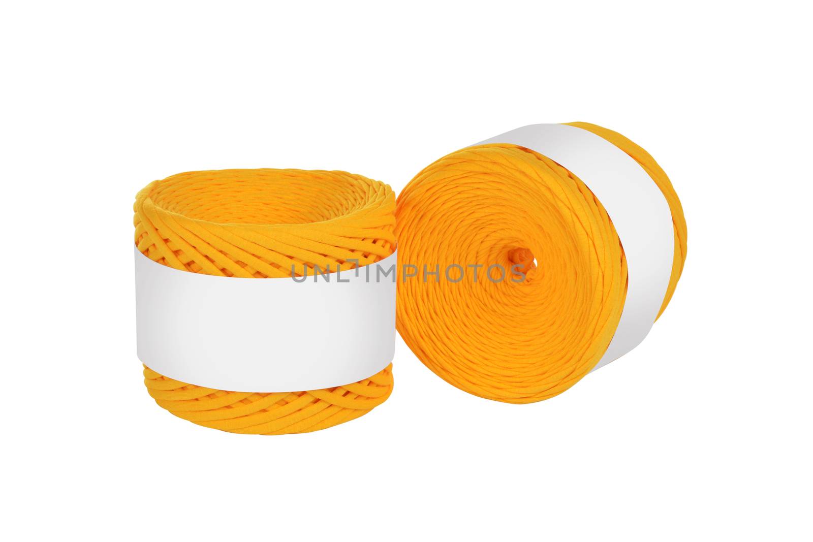 Two skeins of orange color elastic knitted cotton yarn for crochet. Roll with mockup label layout on white background. Use for handwork, creating wicker baskets and home accessories.