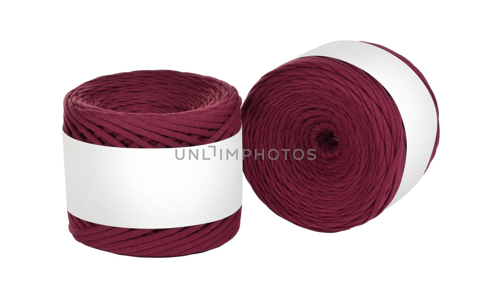 Two skeins of vinous color elastic knitted cotton yarn for crochet. Roll with mockup label layout on white background. Use for handwork, creating wicker baskets and home accessories.