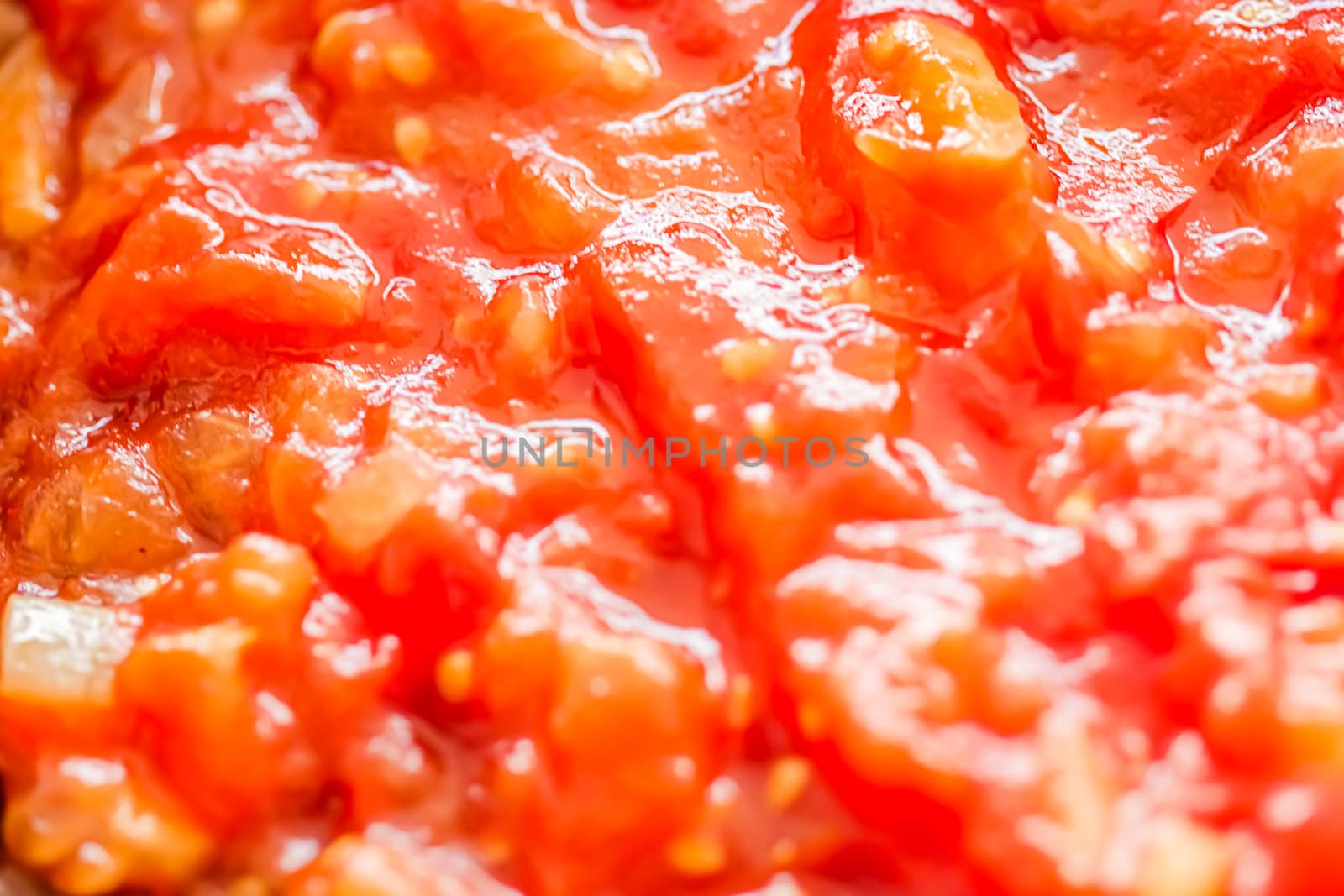 Cooking tomato sauce, closeup steamed vegetables for cook book or food blog background by Anneleven