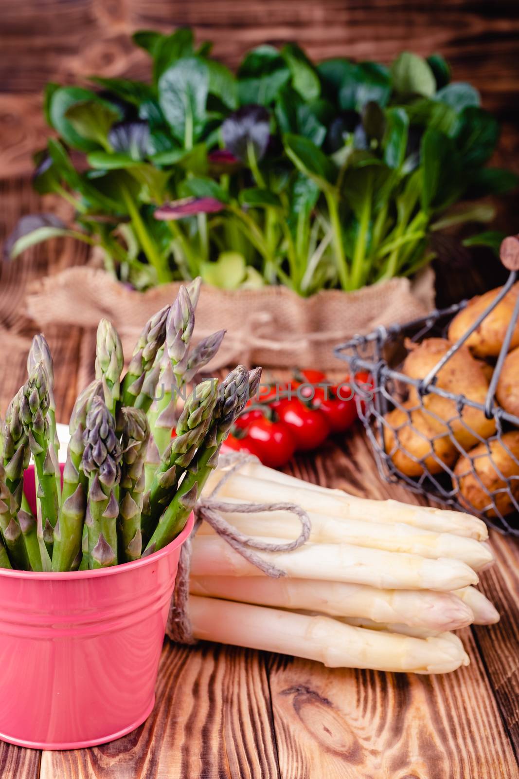 Set of fresh products for healthy food on wooden table. by Fischeron