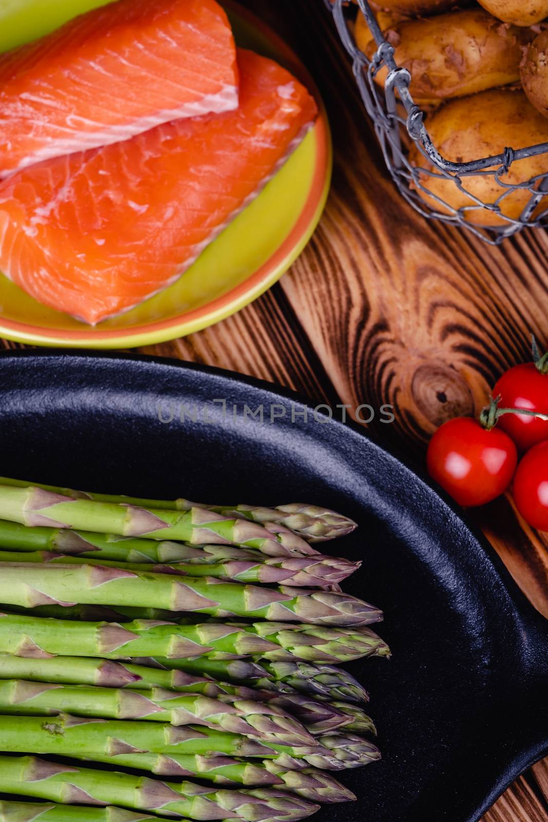 Set of fresh products for healthy food on wooden table by Fischeron