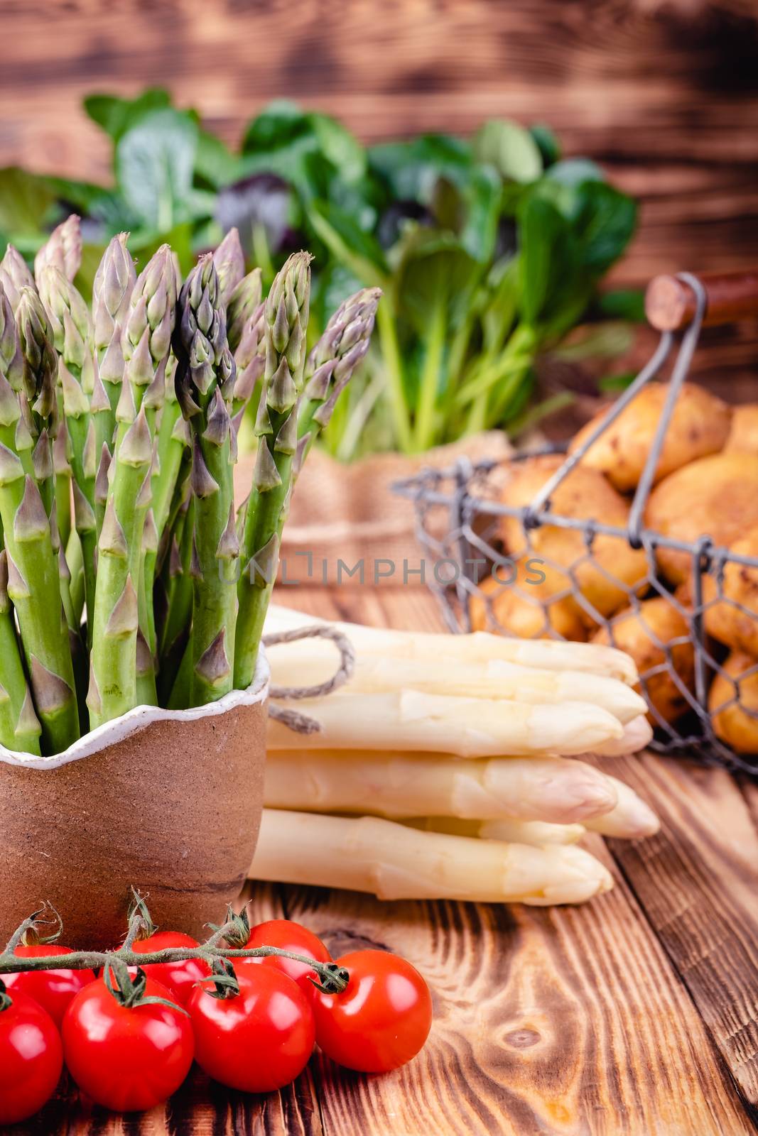 Set of fresh products for healthy food on wooden table. by Fischeron