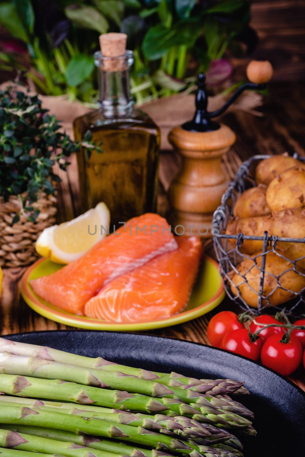 Set of fresh products for healthy food on wooden table by Fischeron