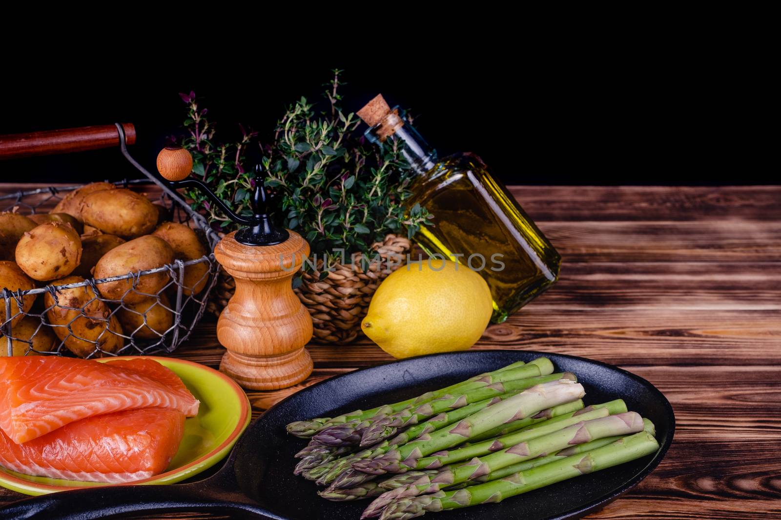 Set of fresh products for healthy food on wooden table by Fischeron