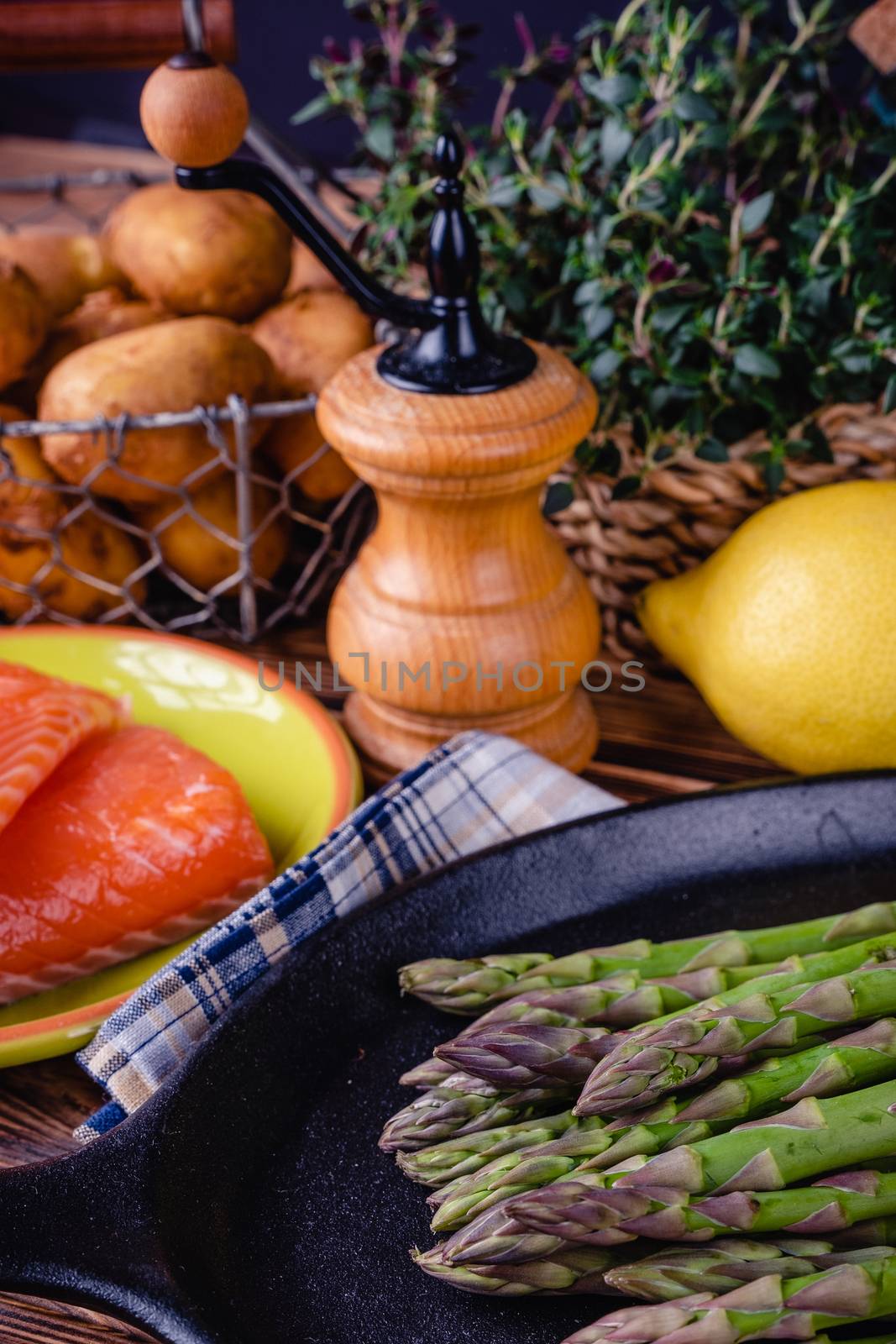 Set of fresh products for healthy food on wooden table by Fischeron