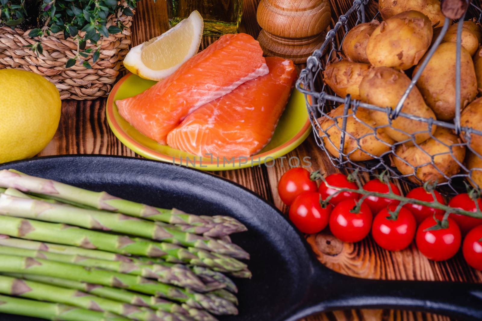 Set of fresh products for healthy food on wooden table by Fischeron