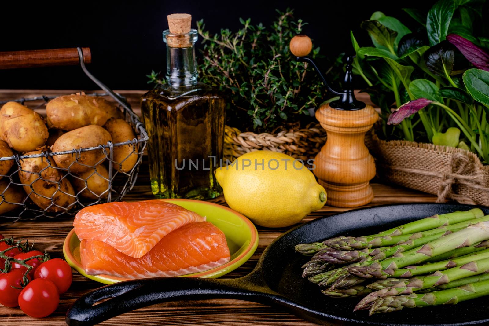 Set of fresh products for healthy food on wooden table by Fischeron