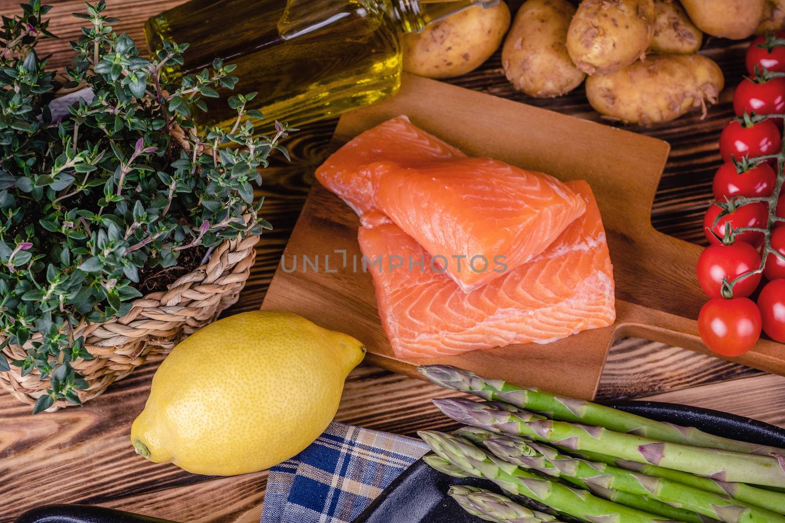 Set of fresh products for healthy food on wooden table by Fischeron