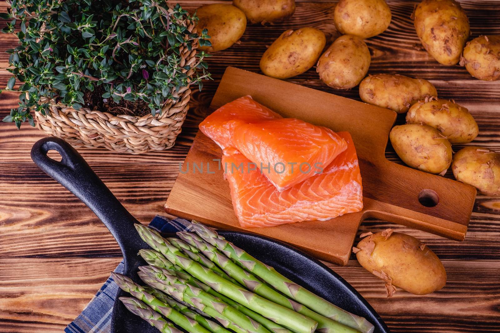 Set of fresh products for healthy food on wooden table by Fischeron