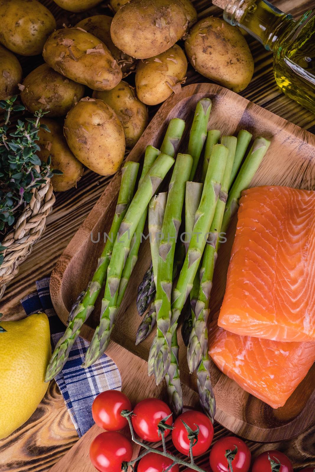 Set of fresh products for healthy food on wooden table by Fischeron