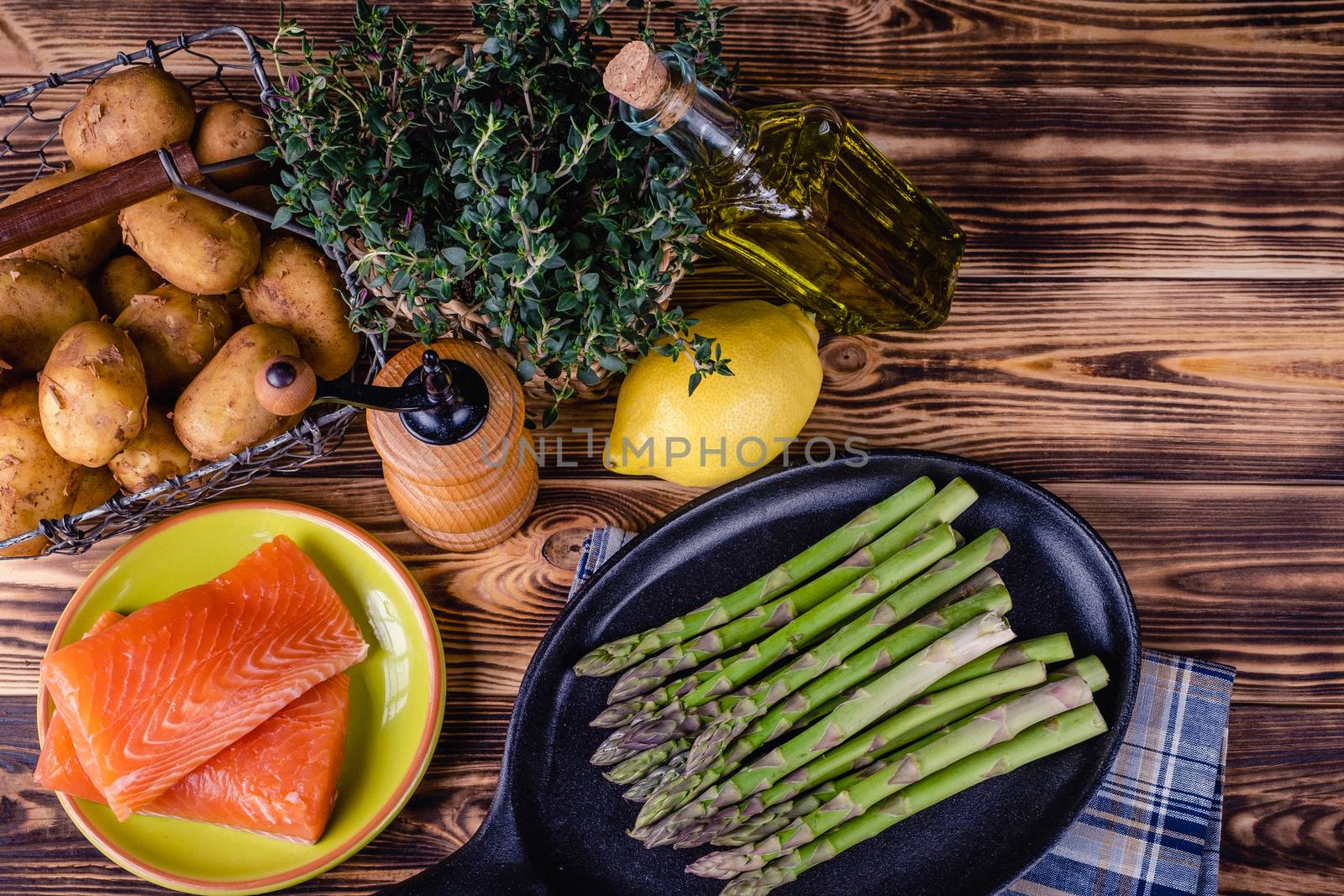 Set of fresh products for healthy food on wooden table by Fischeron