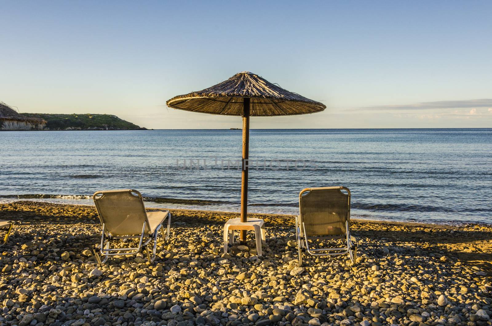 contemplating the horizon and the cliffs in the Ionian sea from a deck chair