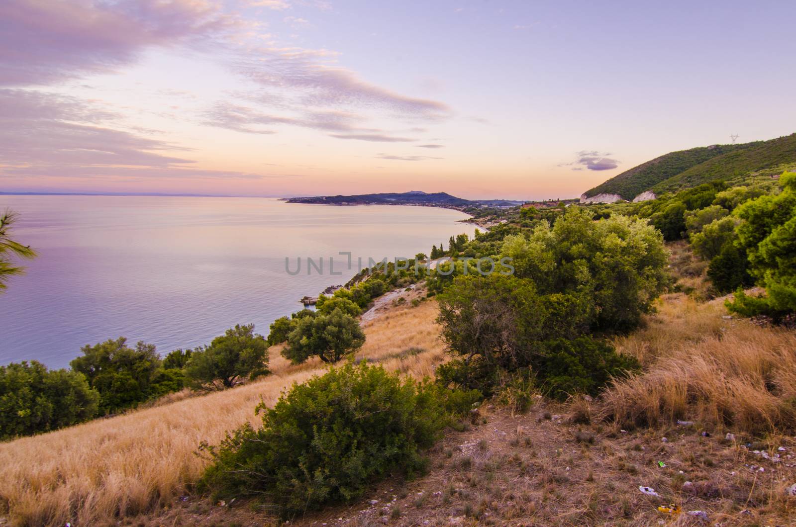 View from the top of a mountain on the island of Zakynthos at sunset over the Ionian sea