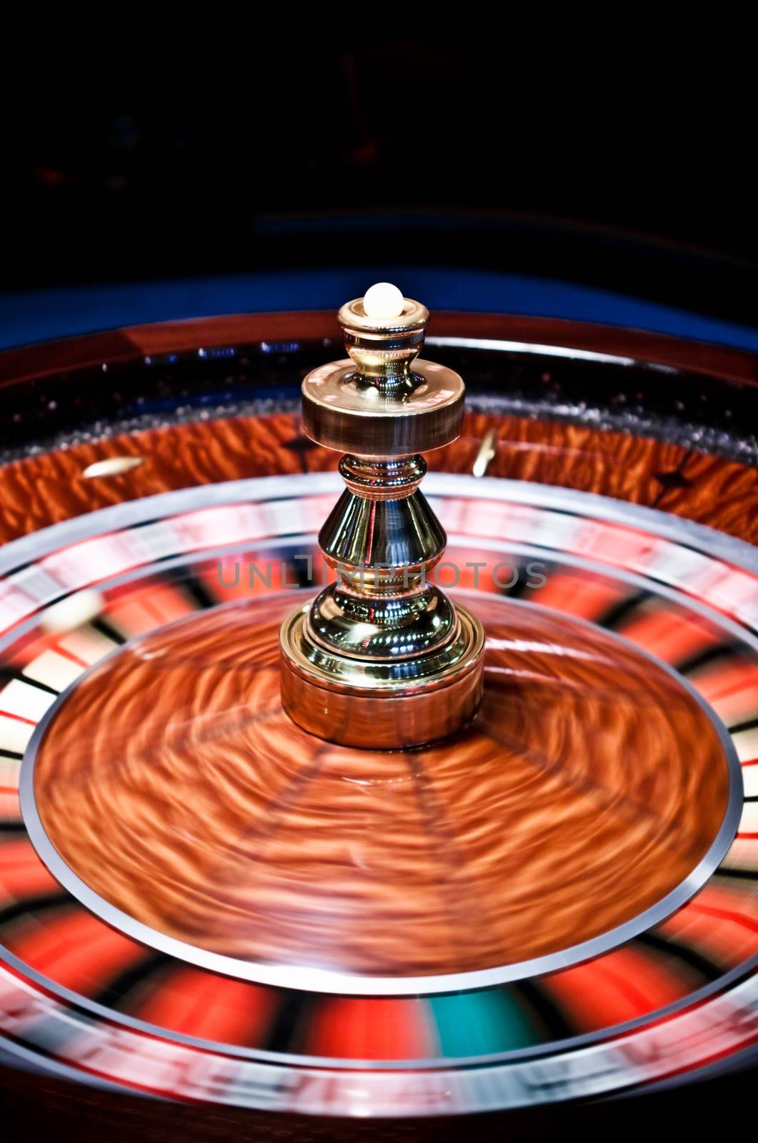 Roulette wheel in casino, gambling ad by Anneleven