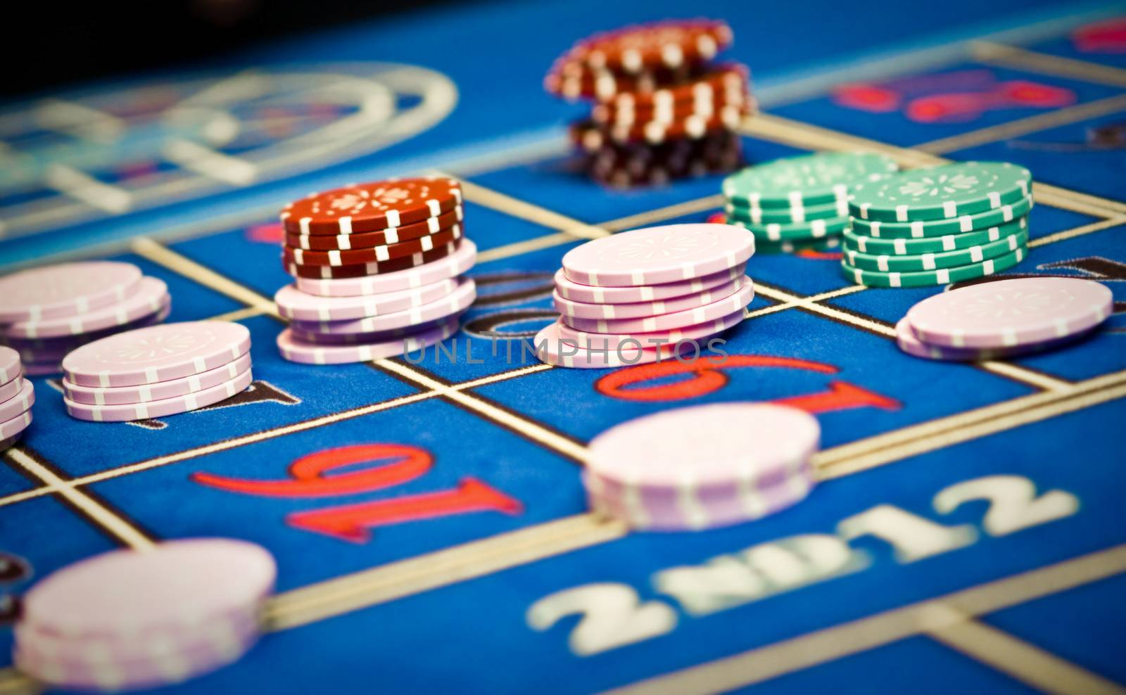 Betting and playing roulette in casino, gambling ads