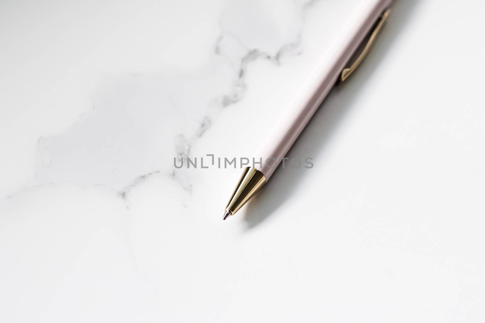 White pen on marble background, luxury stationery and business brand by Anneleven