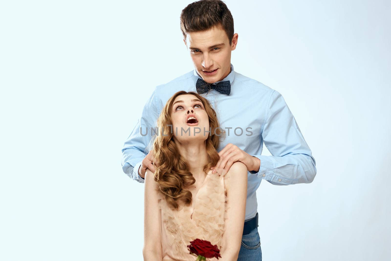 man giving woman roses relationship charm lifestyle embrace lifestyle by SHOTPRIME