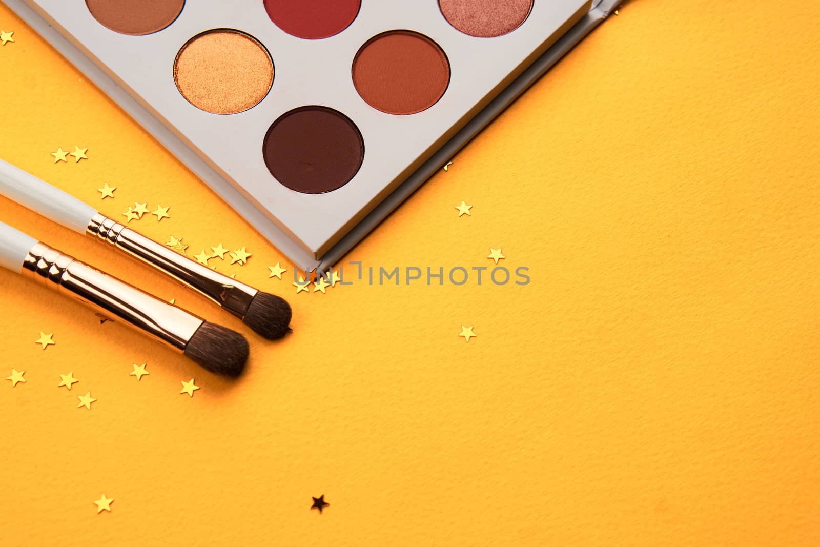 Professional cosmetics palette with eyeshadow makeup brushes cropped look by SHOTPRIME