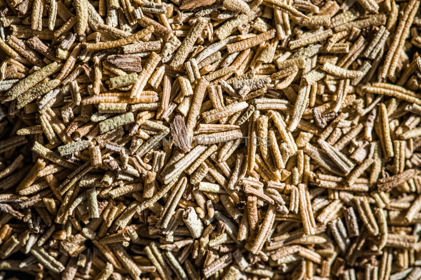 Rosemary closeup on luxury stone background as flat lay, dry food spices and recipe ingredients