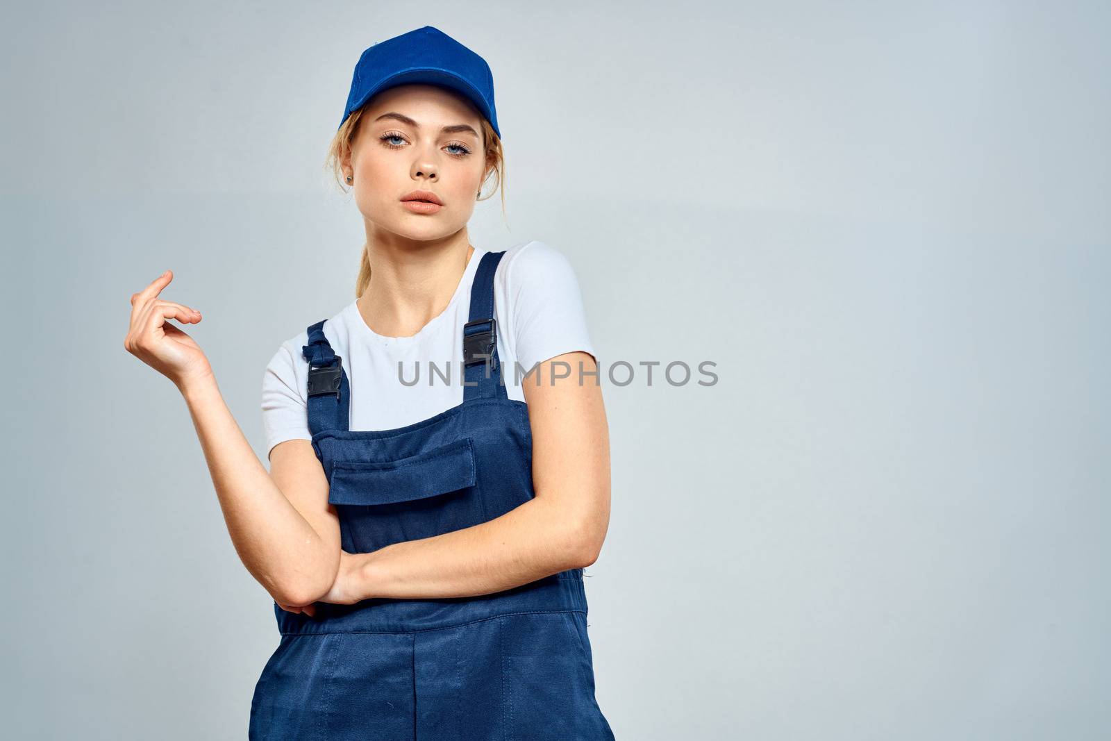 Working woman in uniform courier delivery service lifestyle. High quality photo