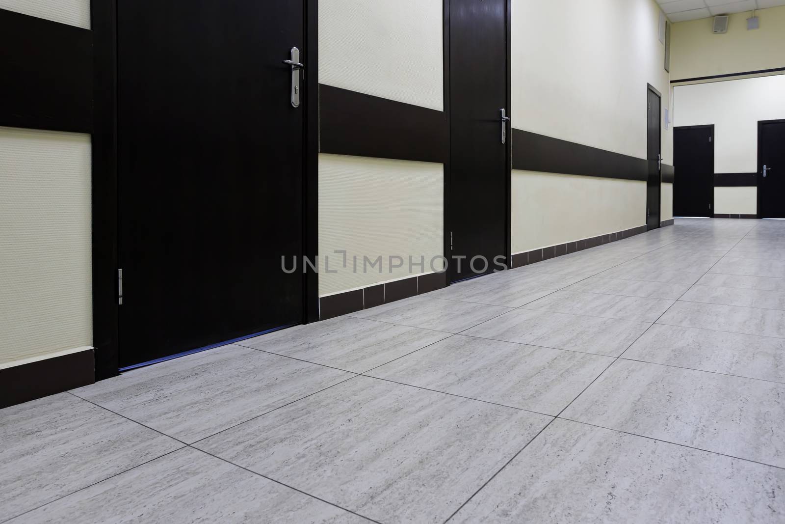 empty corridor in the modern office building by bonilook