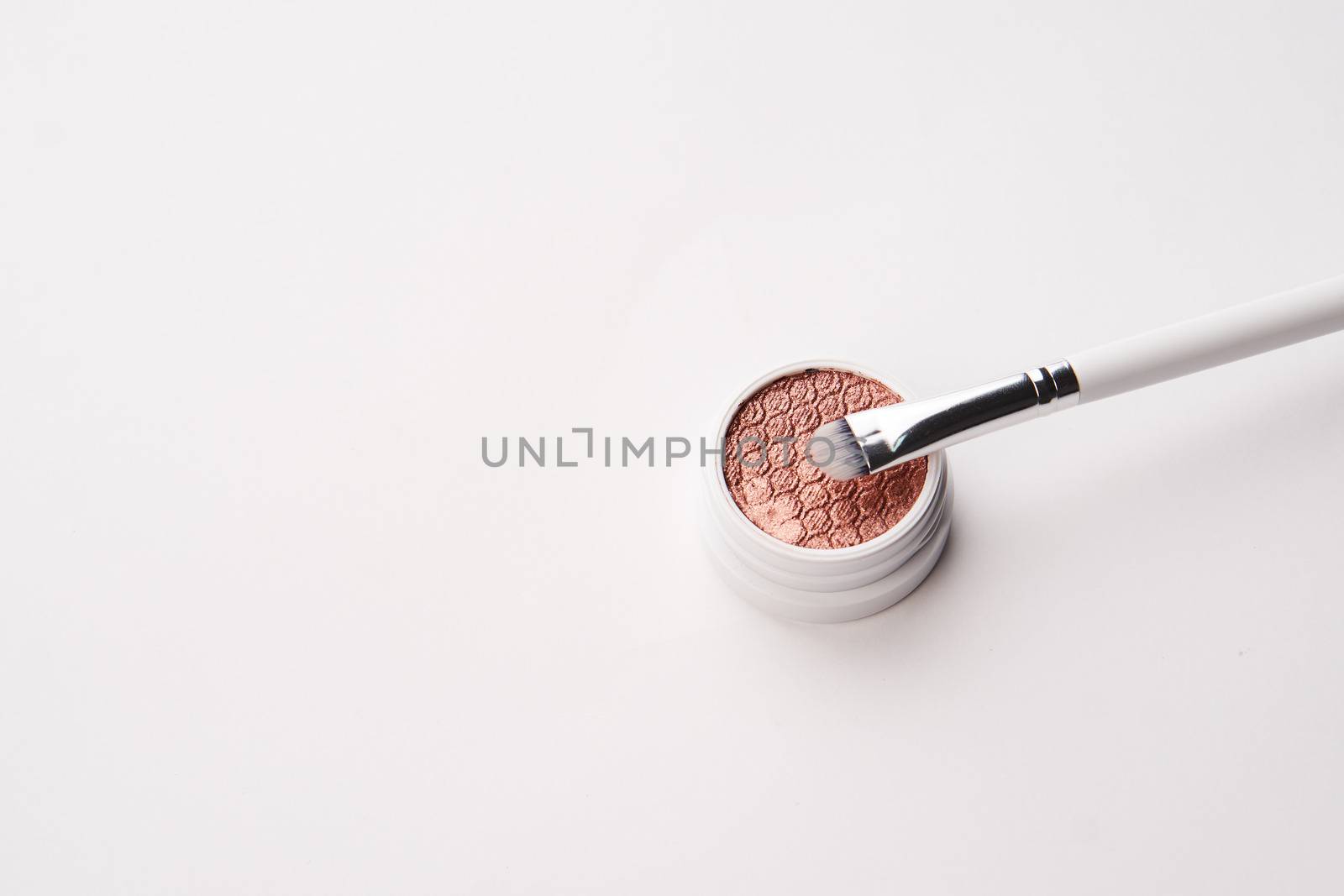 professional eyeshadow on isolated background and makeup brushes cosmetics fashion. High quality photo