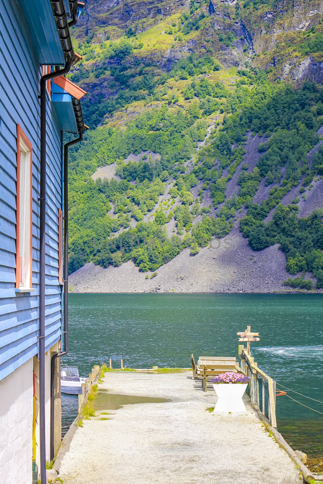 Colorful wooden houses and architecture by the pier in Undredal village Aurlandsfjord Aurland Vestland Sognefjord in Norway.