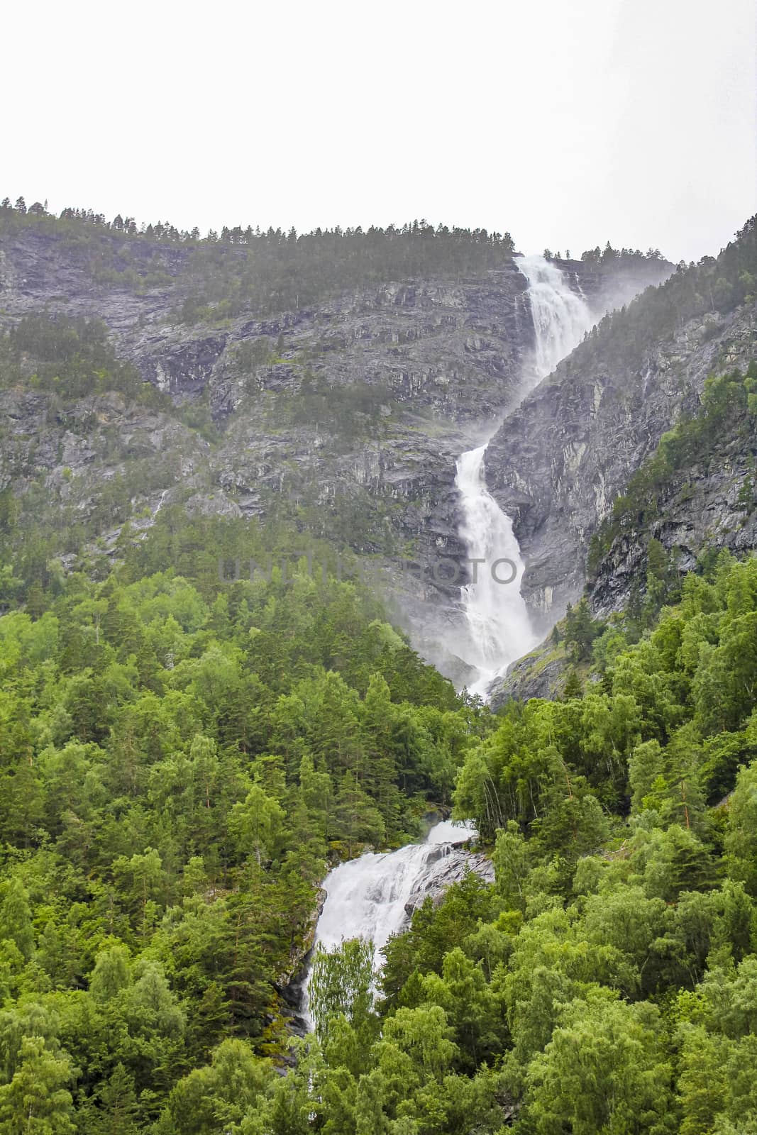 Waterfall in Aurlandsfjord Aurland Sognefjord in Norway. by Arkadij