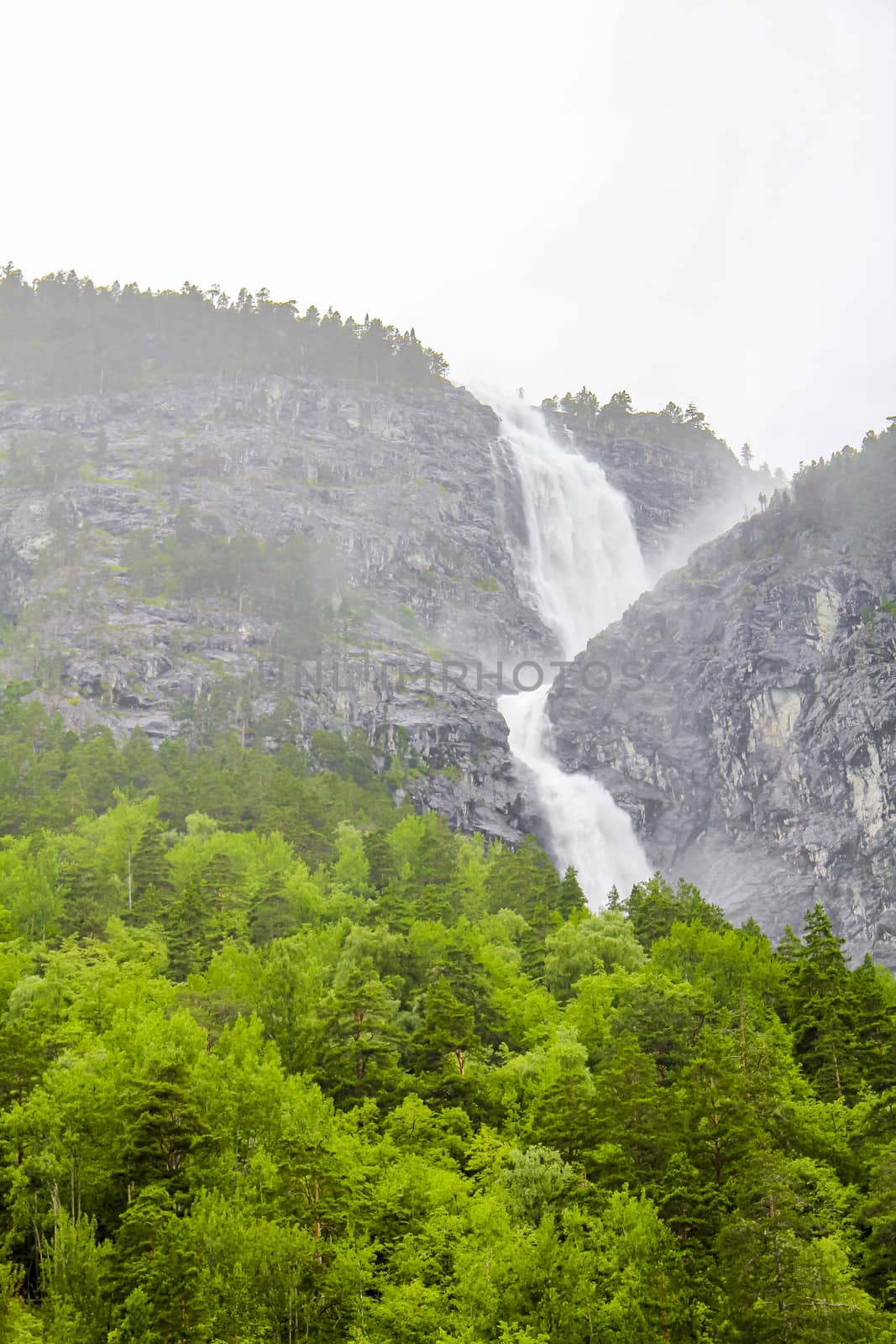 Waterfall in Aurlandsfjord Aurland Sognefjord in Norway. by Arkadij