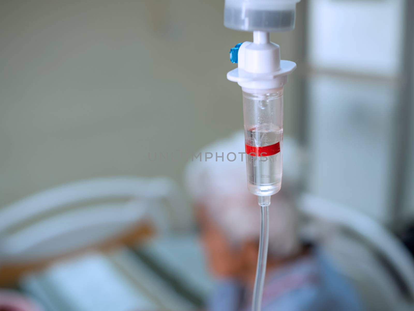 Close up saline solution drip for patient in hospital. Health an by Unimages2527