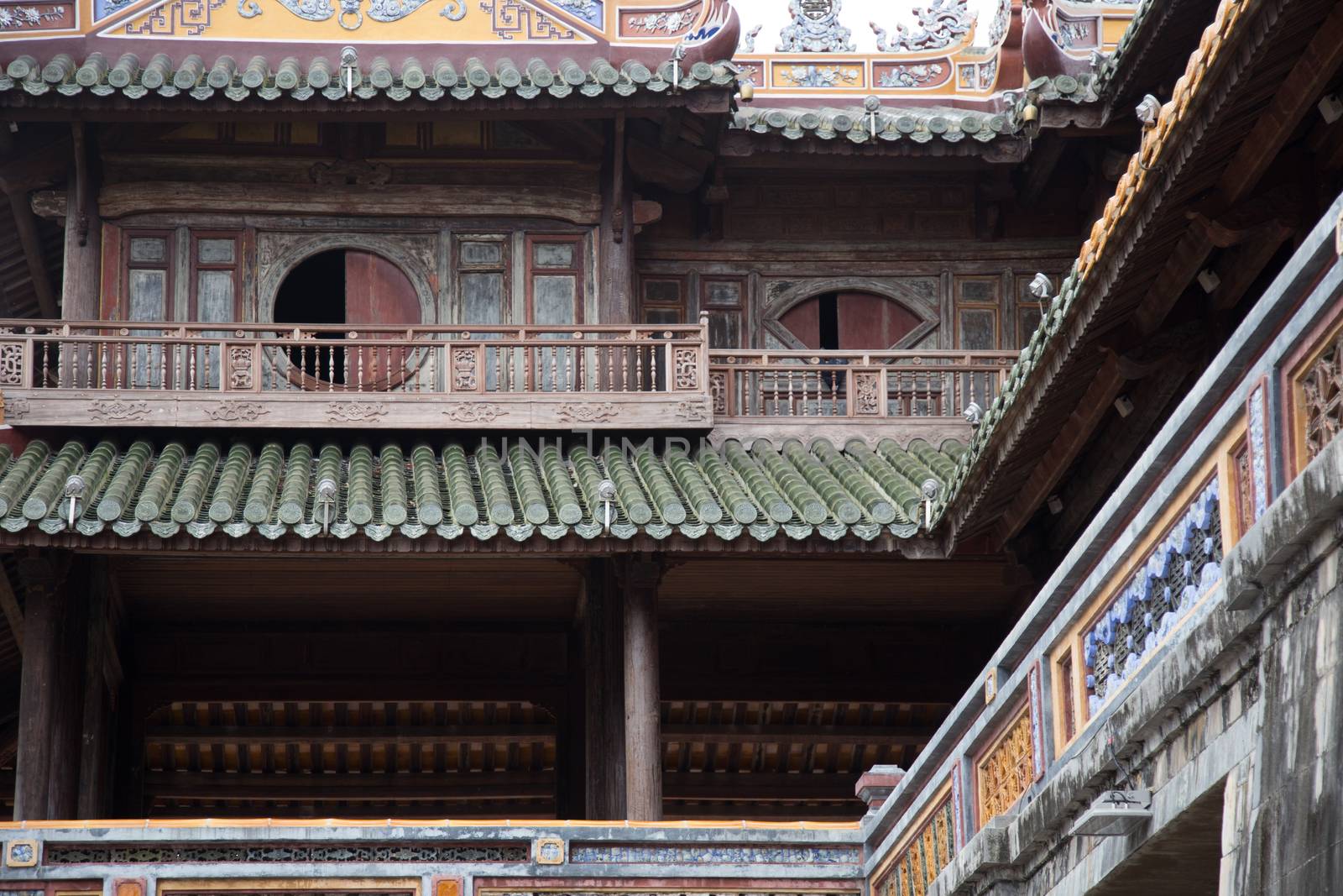 Hue, ancient capital of Vietnam. architecture detail of roofs and decorations by kgboxford