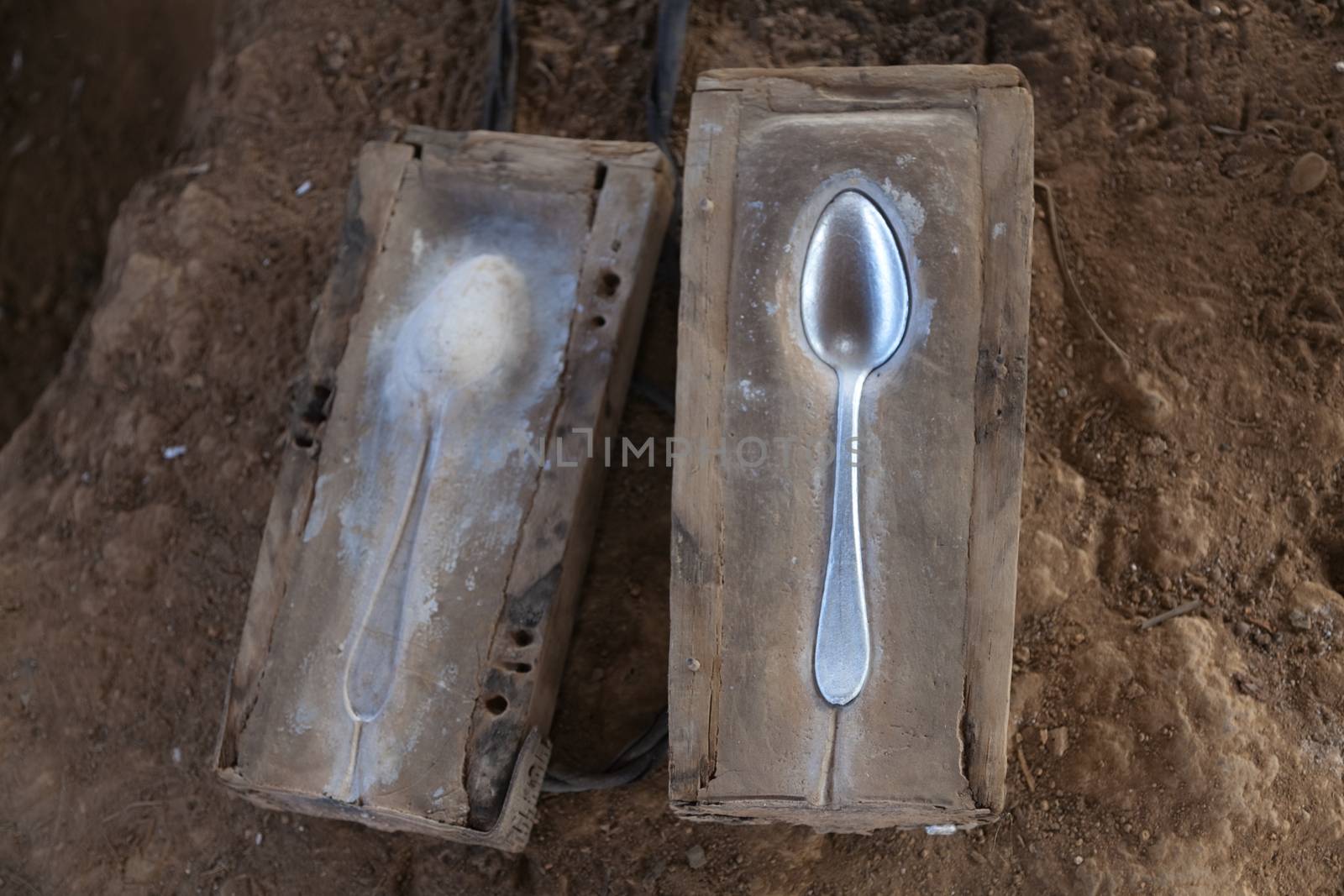 Ban Napia near Phonsavan Laos a village where people makes spoons from bombs leftover from Vietnam war. Examples of moulds used to make spoons from molten aluminium.High quality photo