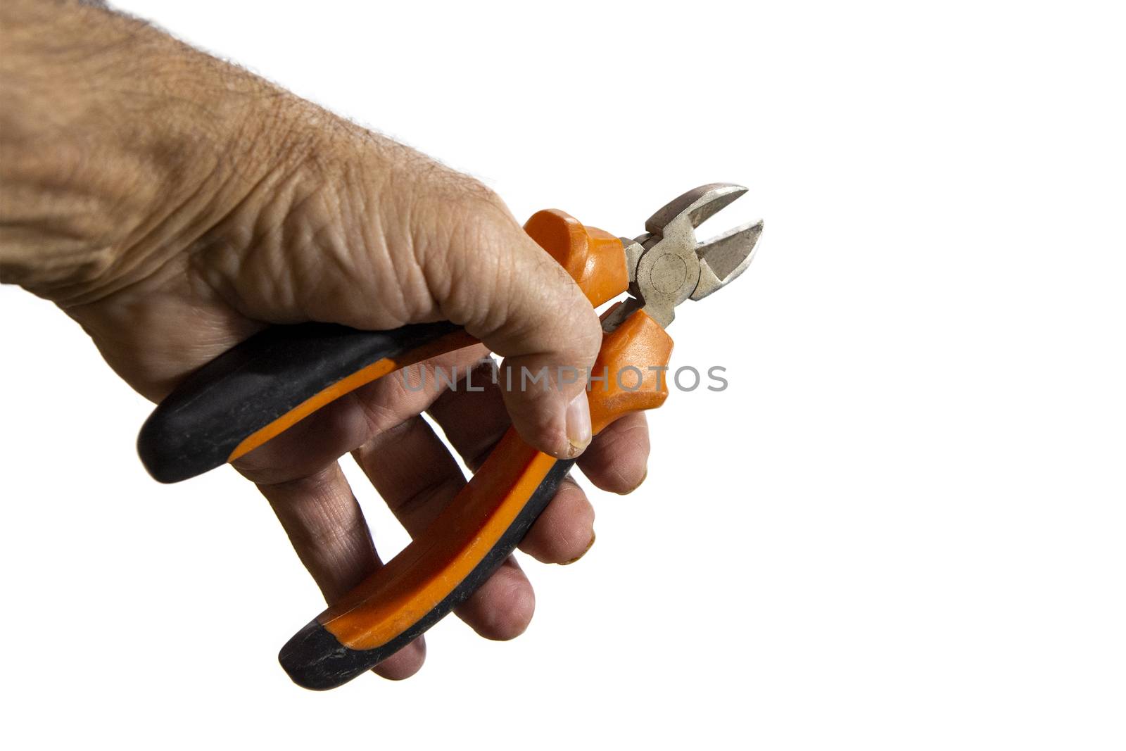Hand holding wire cutters isolated against white background